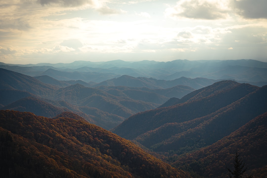 Layered Blue Ridge mountain ranges in fall colors near Asheville