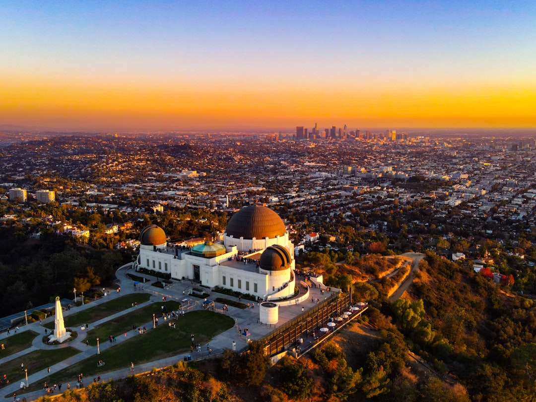 Griffith Observatory at night overlooking the Los Angeles city lights