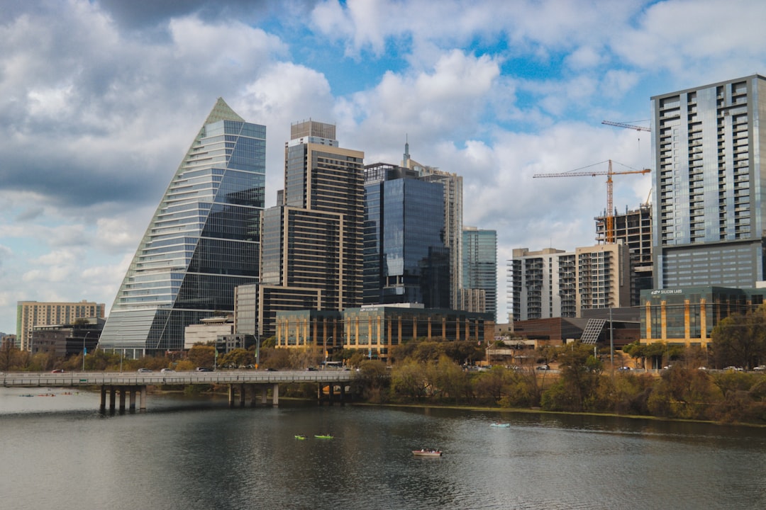 Austin skyline reflected in Lady Bird Lake on a sunny day