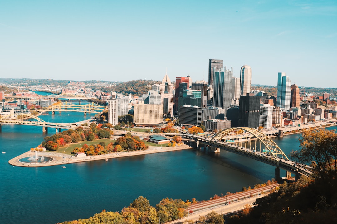 aerial view of Pittsburgh city skyline, bridges, and rivers at daytime